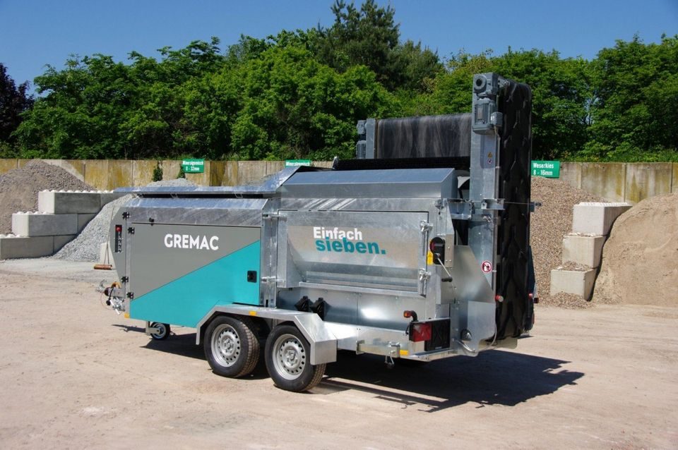 Gremac e1 mit Steingitter und Aufbau – Seitenansicht